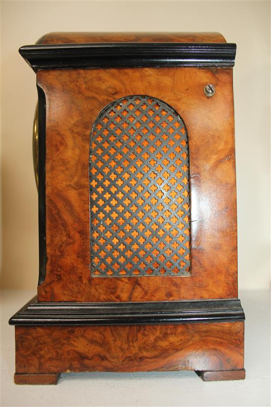 A Victorian ebonised and burr walnut single fusee mantel timepiece, 10.5in.
